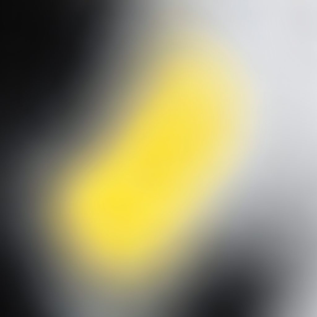 Abstract gradient composition in deep charcoal and pale grey, subtle vertical fade with no figures